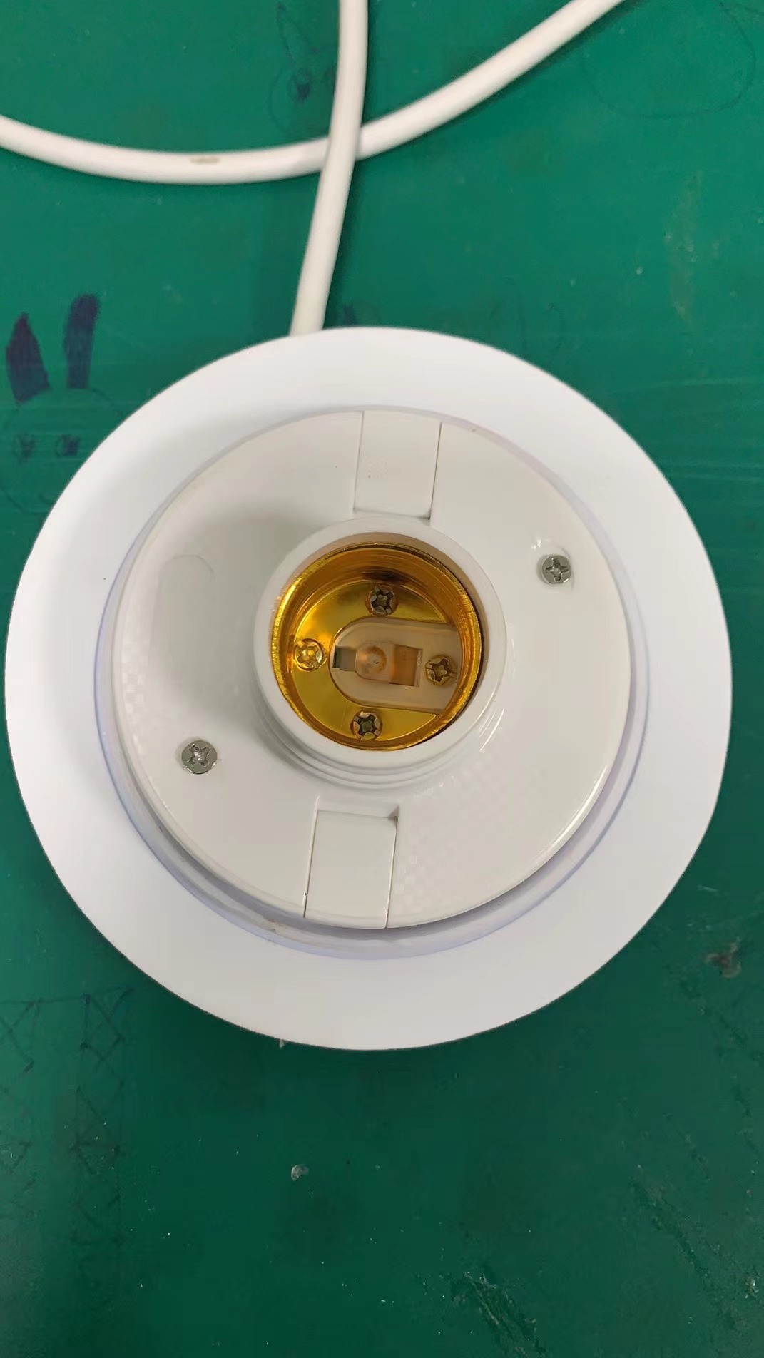 Close view of the E27 socket and white 120 mm mounting base