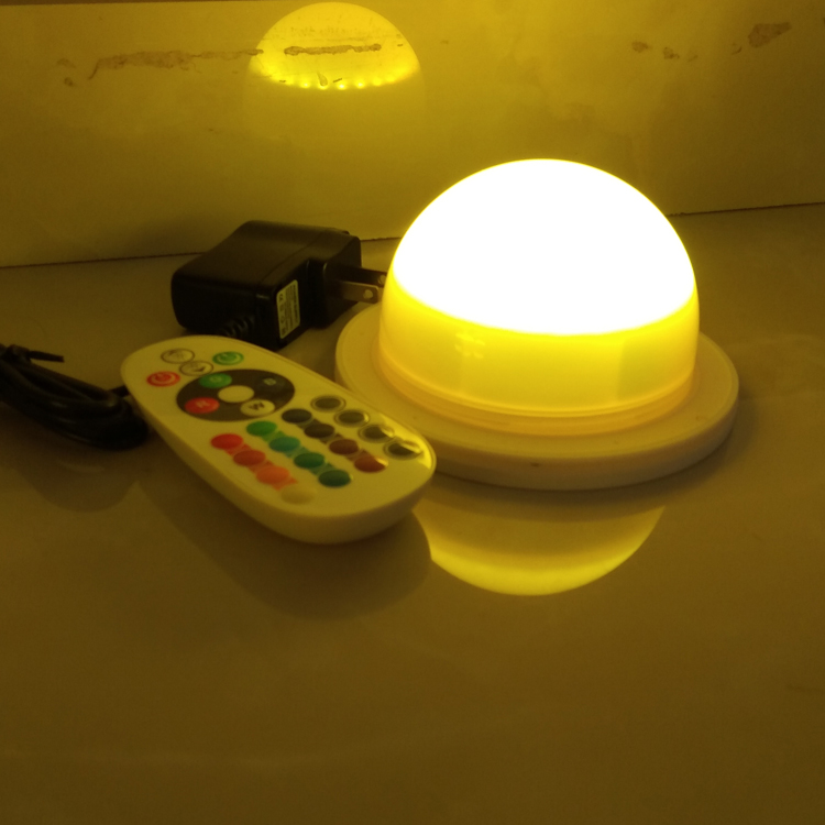 Real Vcan dome LED module showing a yellow-toned lighting effect