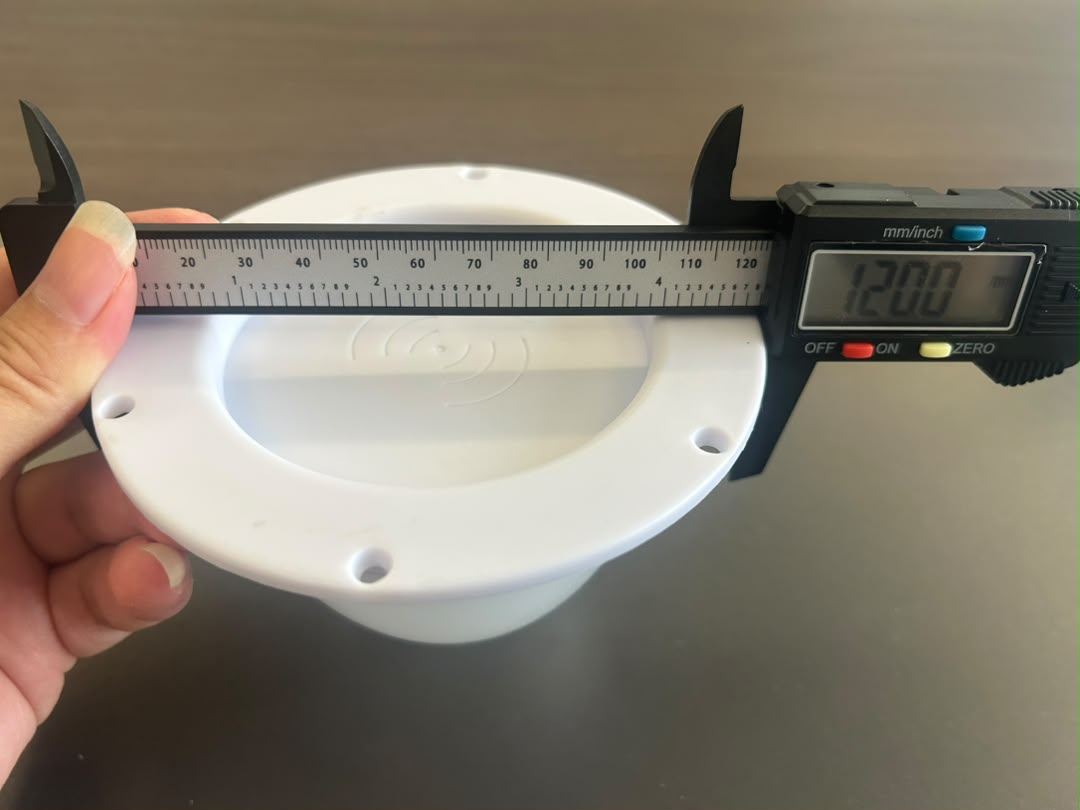 Caliper measuring VC-LI120 sample overall base diameter at 120.0 mm