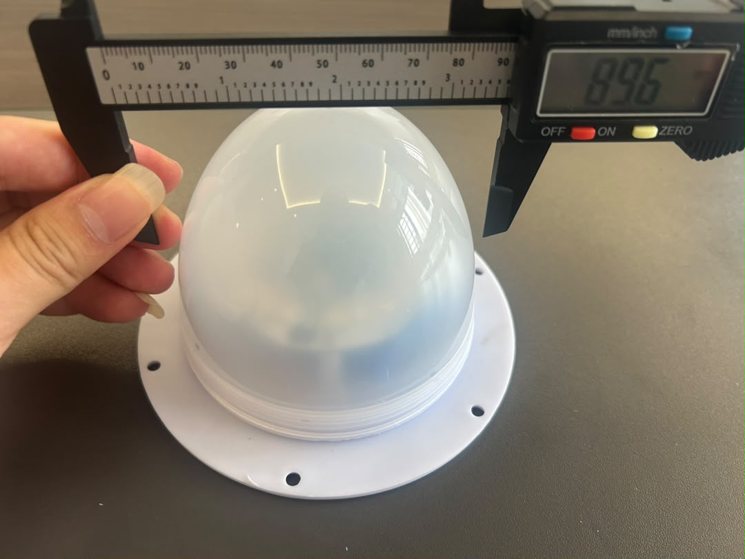 Caliper measuring VC-LI120 sample cover outside width at 89.6 mm