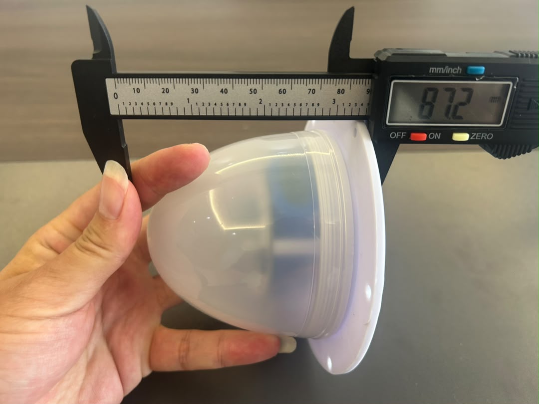 Caliper measuring VC-LI120 sample overall height at 87.2 mm