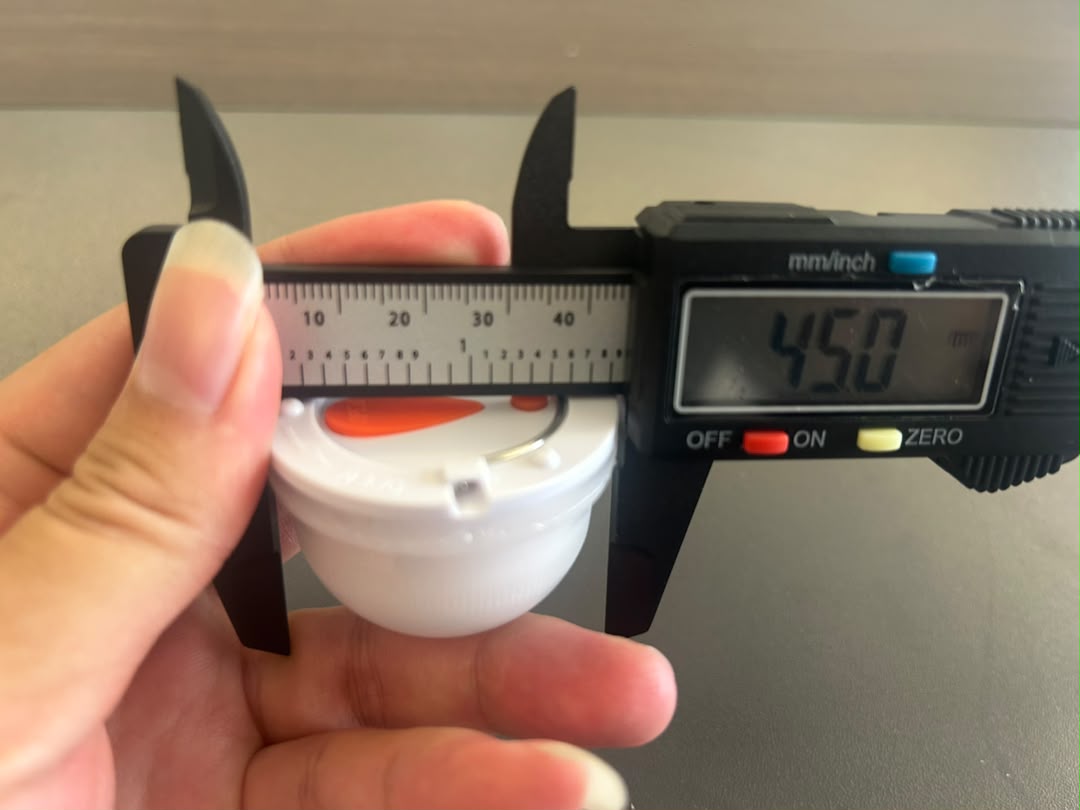 Caliper measuring VC-LS45 sample overall base diameter at 45.0 mm