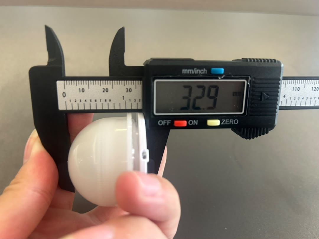 Caliper measuring VC-LS45 sample housing height (excluding button) at 32.9 mm