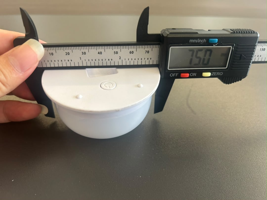 Caliper measuring VC-LS75 sample overall base diameter at 75.0 mm