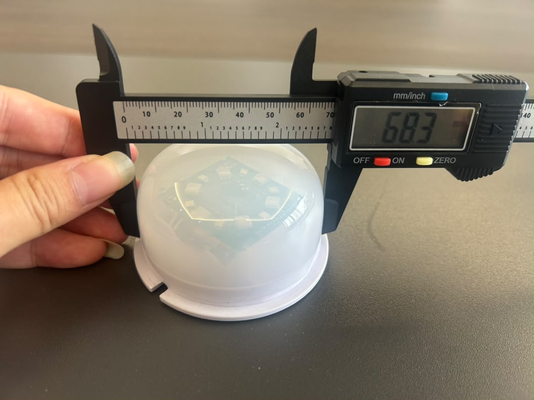 Caliper measuring VC-LS75 sample cover outside width at 68.3 mm