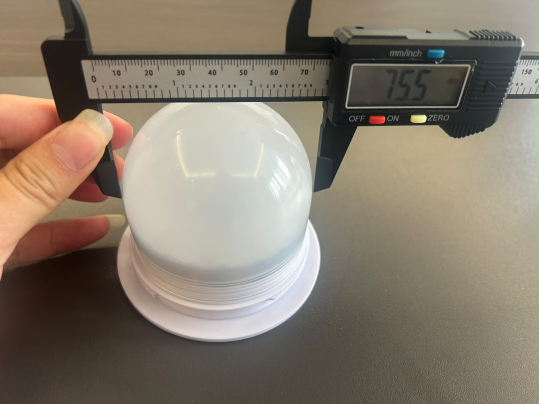 Caliper measuring VC-LS90 sample cover outside width at 75.5 mm